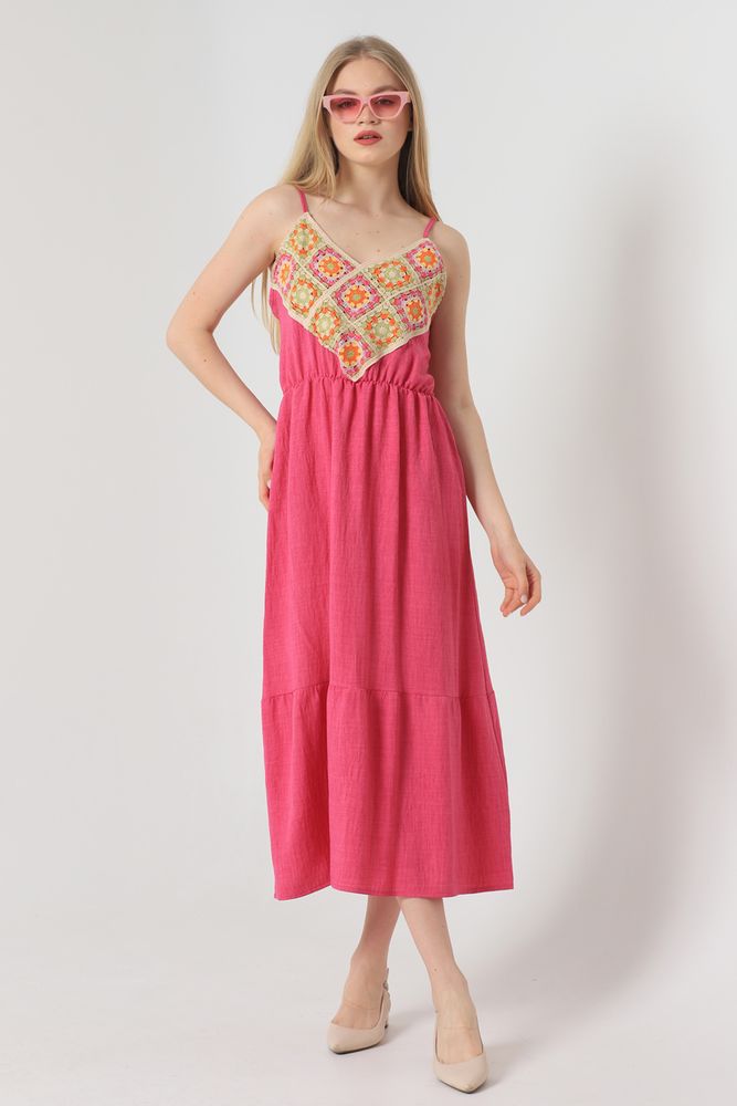 Fuchsia in front of the long dress with embroidery